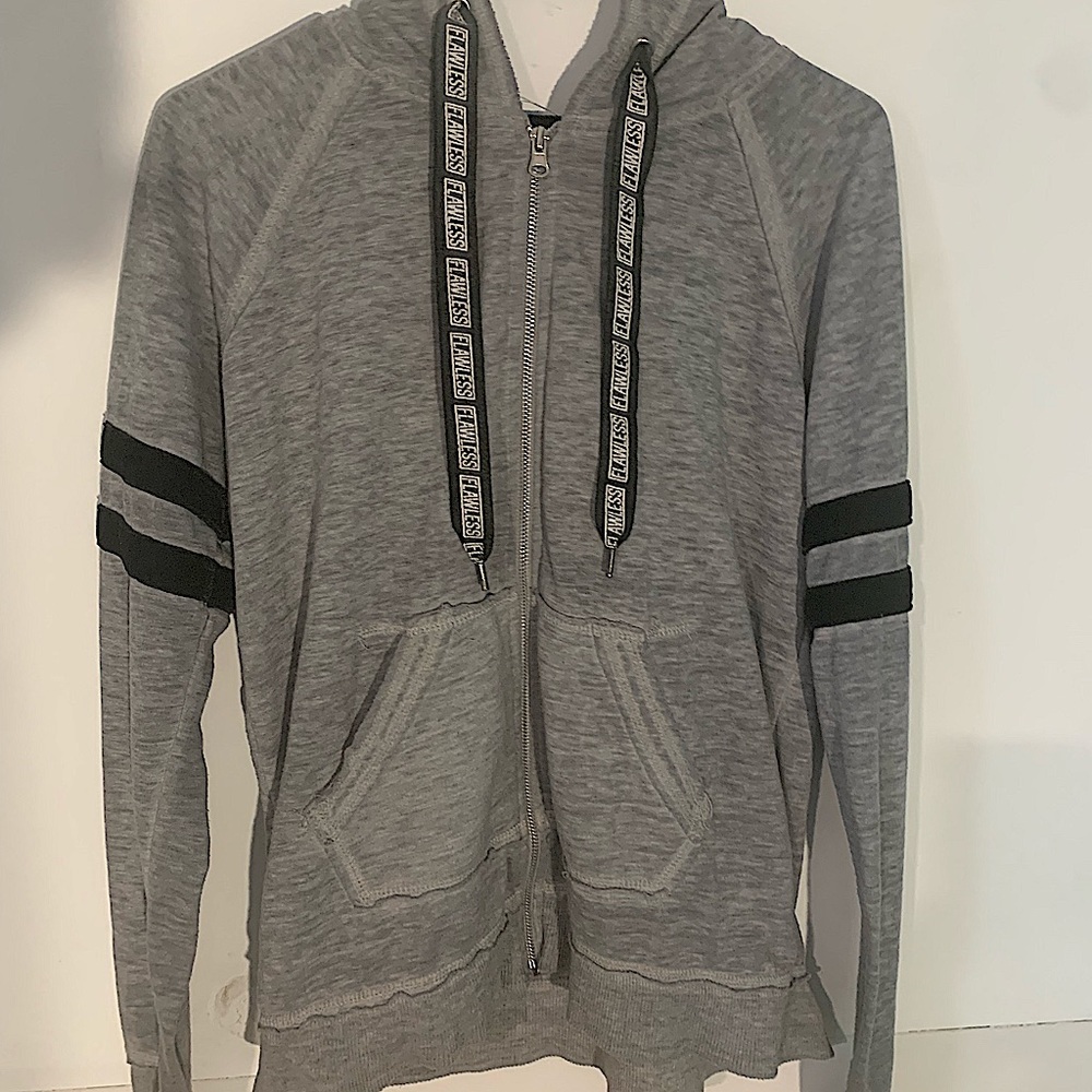 Grey hoodie with 2 black stripes on each sleeve.